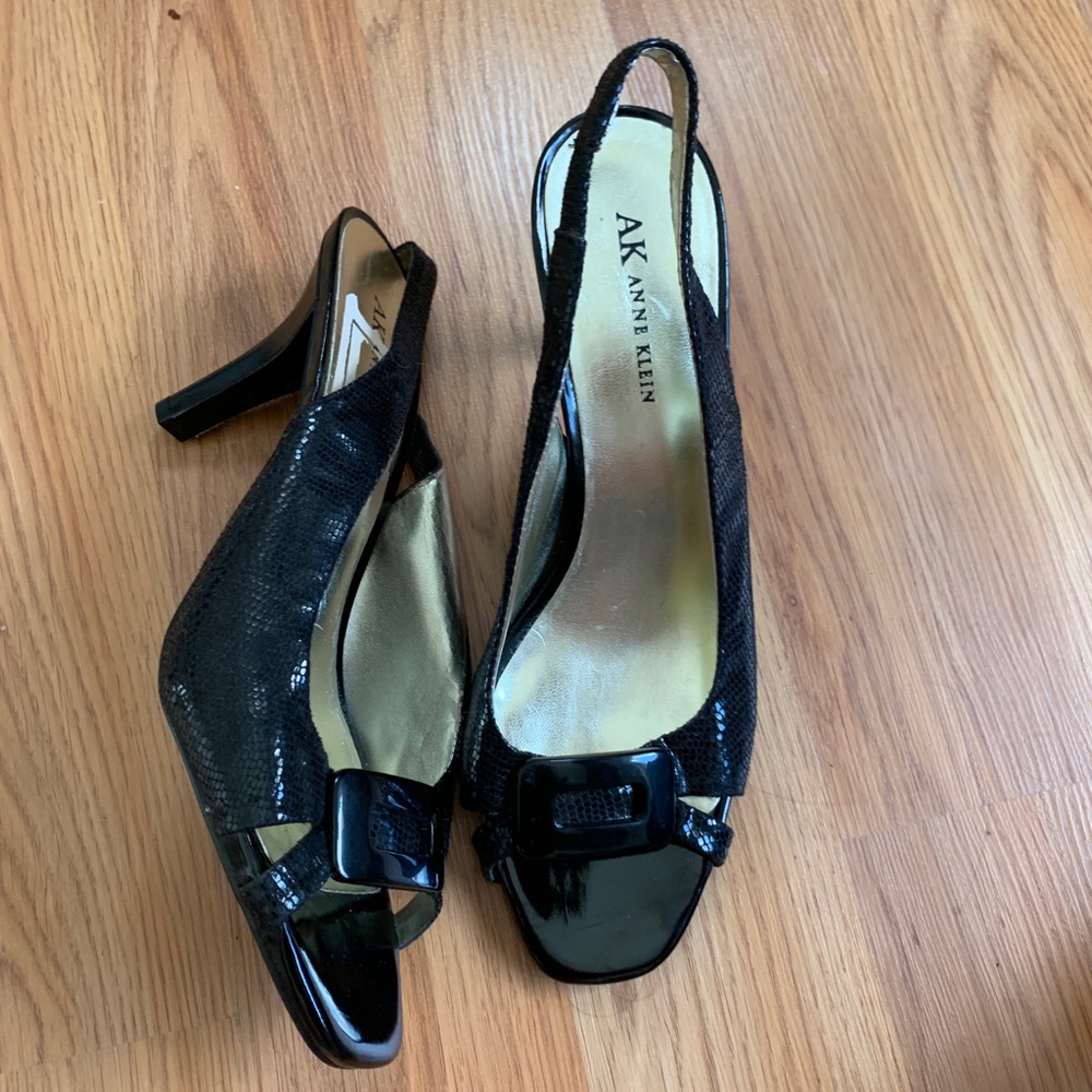 Black open toes heels with embellishment!